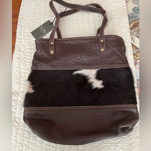 NWT fur and leather Myra Bag. Never used, small scuff from storage as pictured